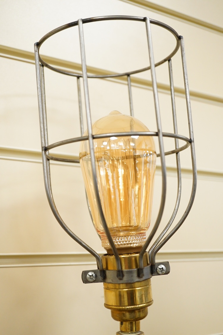A copper fire extinguisher mounted as a table lamp, overall 93cm high